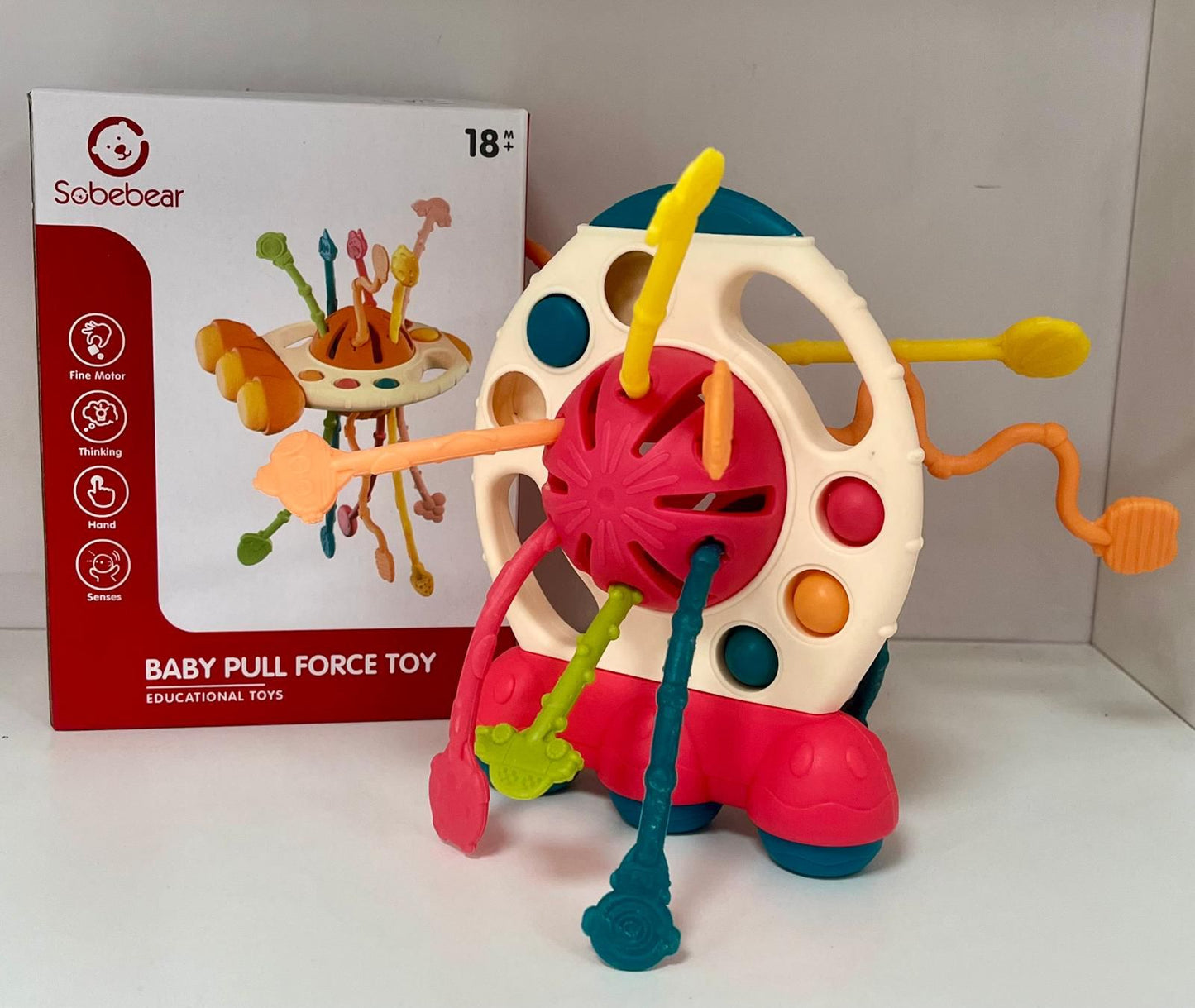 Juguete Sensorial de goma con cuerdas