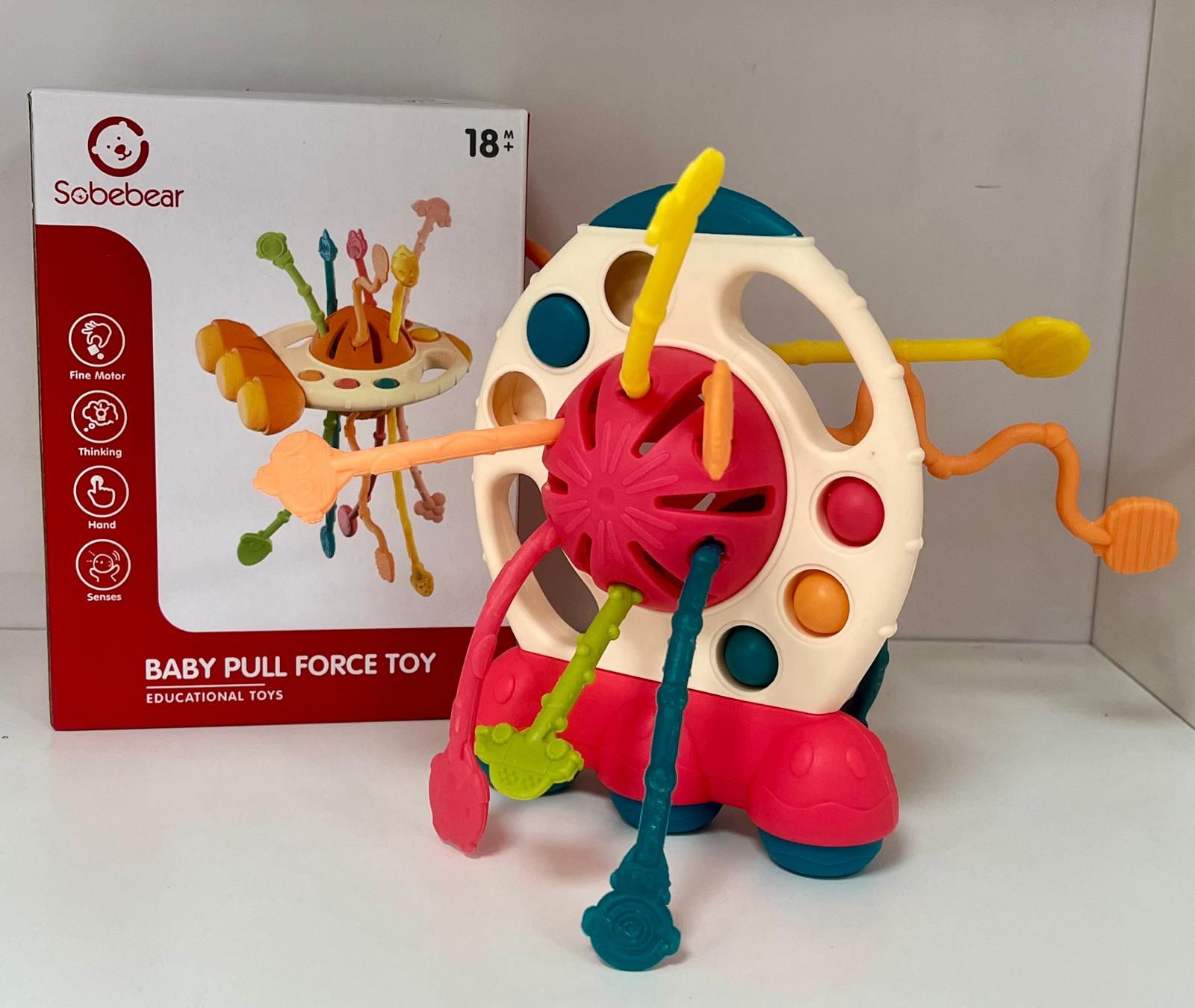 Juguete Sensorial de goma con cuerdas